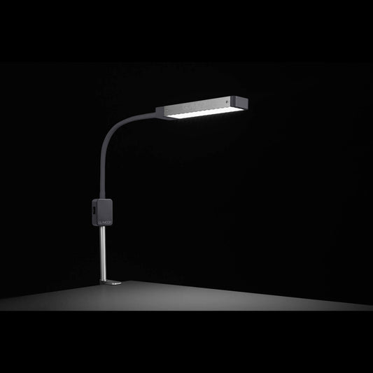 Lámpara GLAMCOR Mono, Lámpara de luz diurna de un brazo con pinza de sujeción para mesa